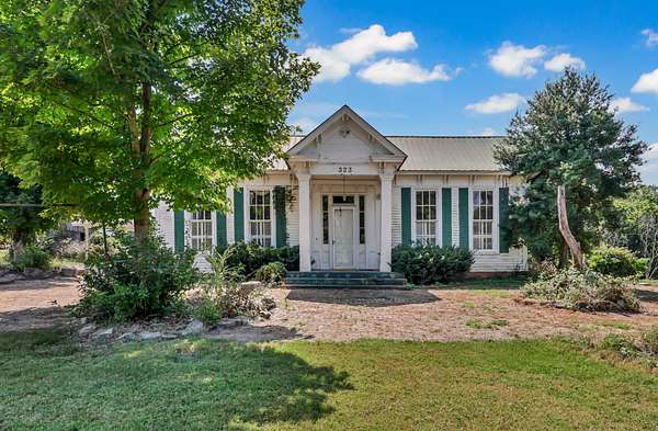 2.79 Acres of Land with Home for Auction in Trenton, Kentucky