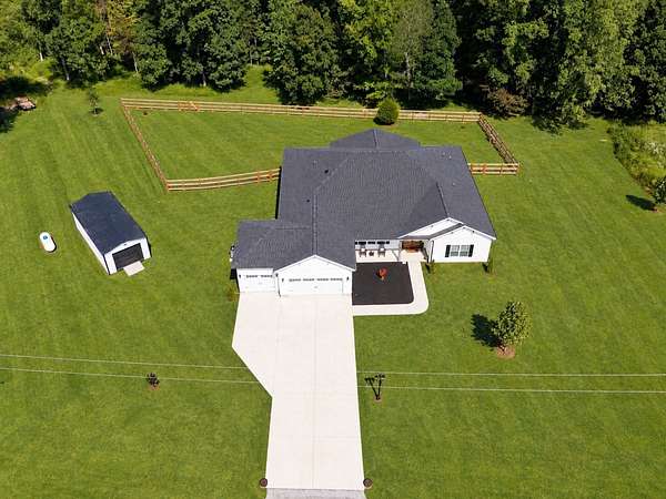 5 Acres of Land with Home for Sale in Bon Aqua, Tennessee