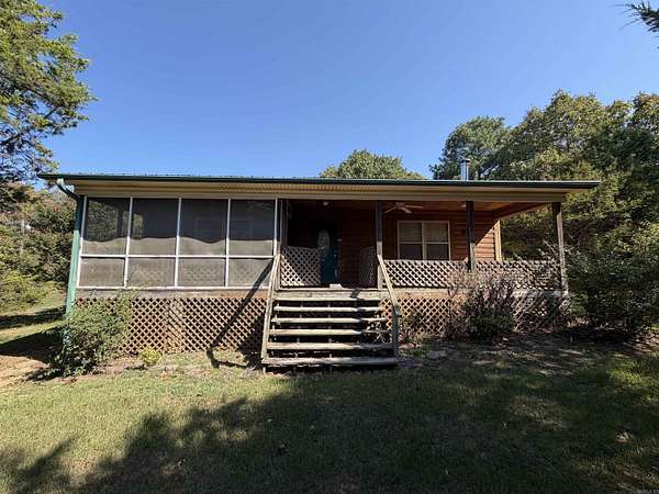 5.2 Acres of Land with Home for Sale in Romance, Arkansas