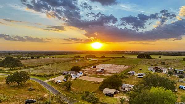 5 Acres of Land with Home for Sale in Floresville, Texas