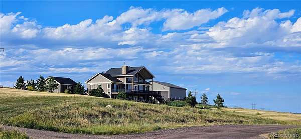 35 Acres of Land with Home for Sale in Larkspur, Colorado