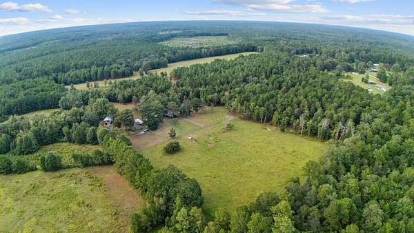 52.2 Acres of Land with Home for Sale in Kirbyville, Texas