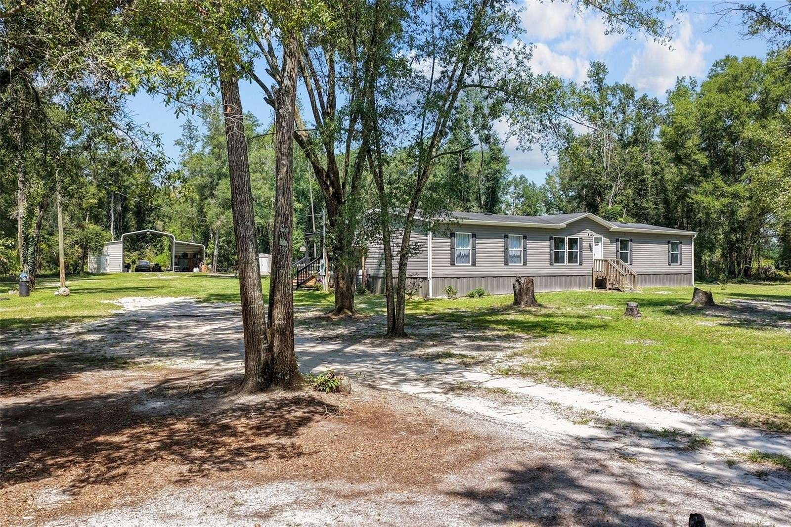 10 Acres of Recreational Land with Home for Sale in Fort White, Florida