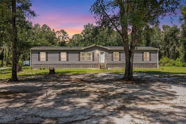 10 Acres of Land with Home for Sale in Fort White, Florida