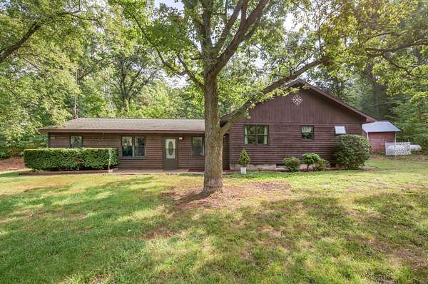 10 Acres of Recreational Land with Home for Sale in Evart, Michigan