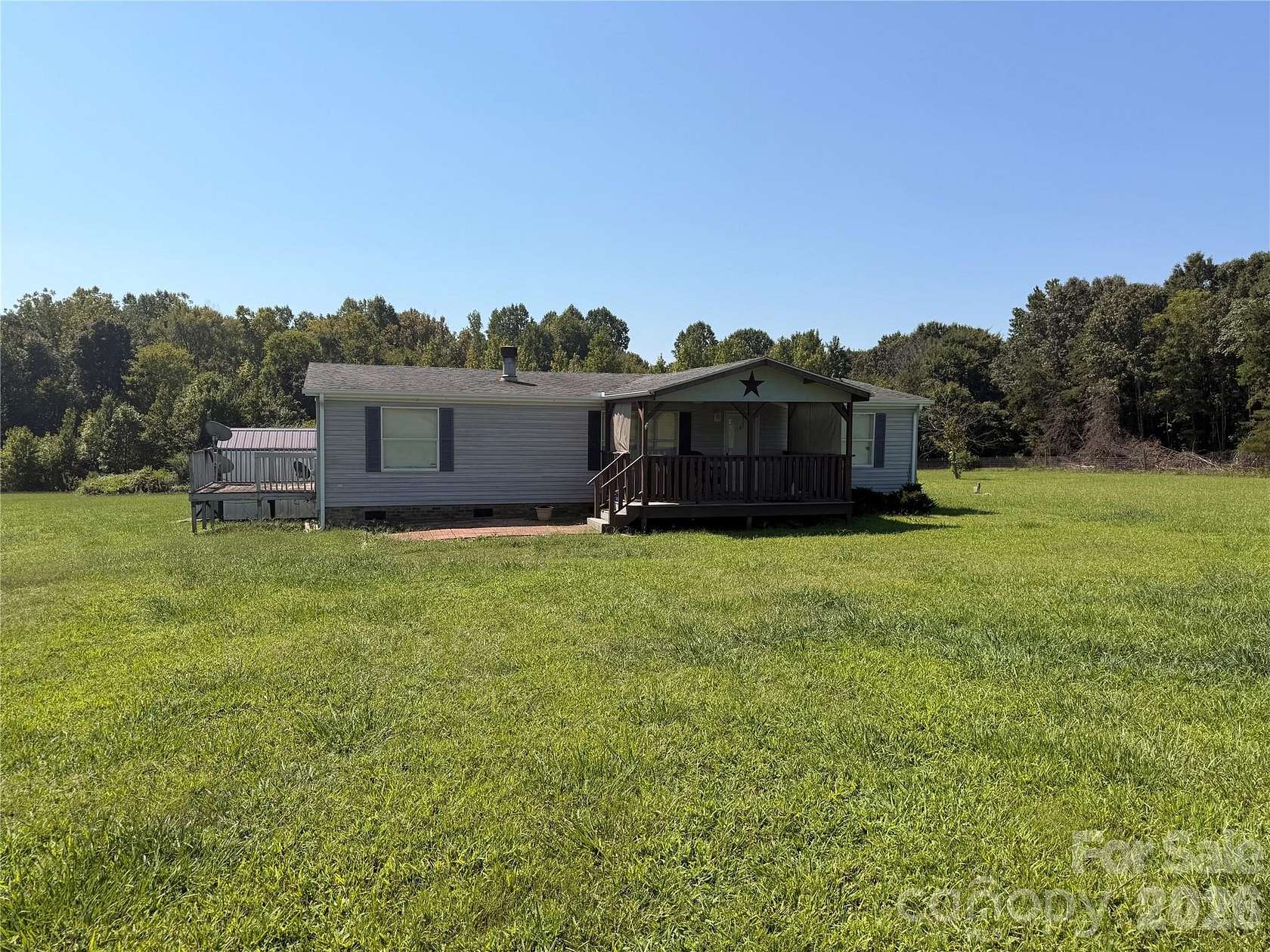 4.77 Acres of Land with Home for Sale in Rockwell, North Carolina