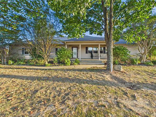 7 Acres of Land with Home for Sale in Cave City, Arkansas