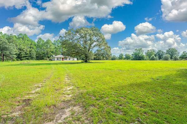 5 Acres of Land with Home for Sale in Holt, Florida