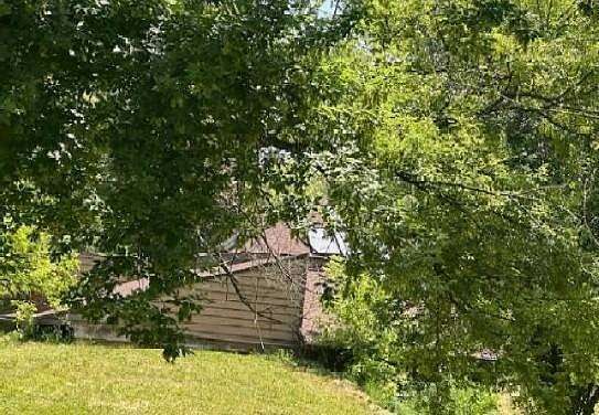 2 Acres of Land with Home for Sale in Flint, Michigan