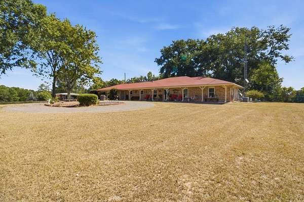 34.3 Acres of Recreational Land with Home for Sale in Alto, Texas