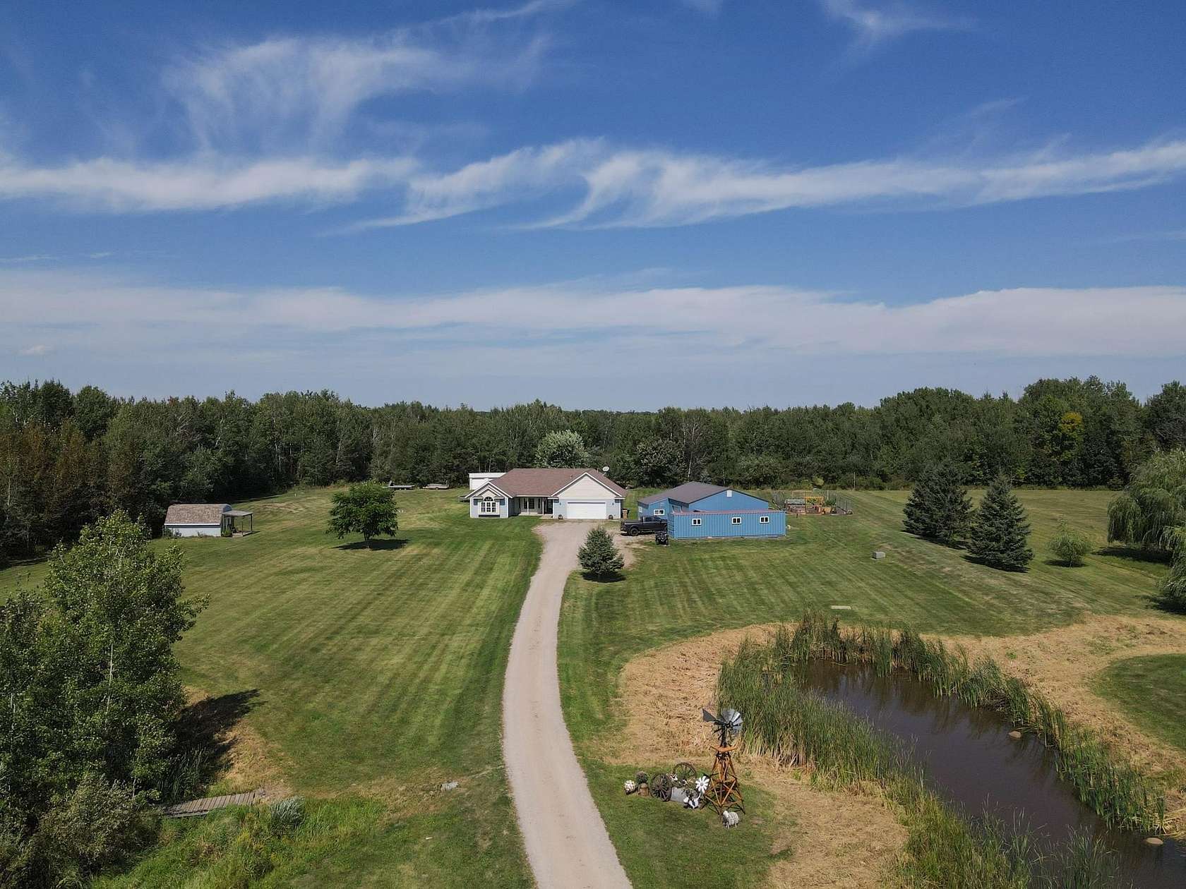10 Acres of Land with Home for Sale in Milaca, Minnesota