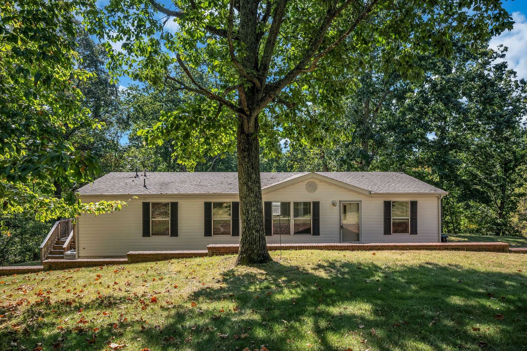 5.77 Acres of Land with Home for Sale in Pegram, Tennessee