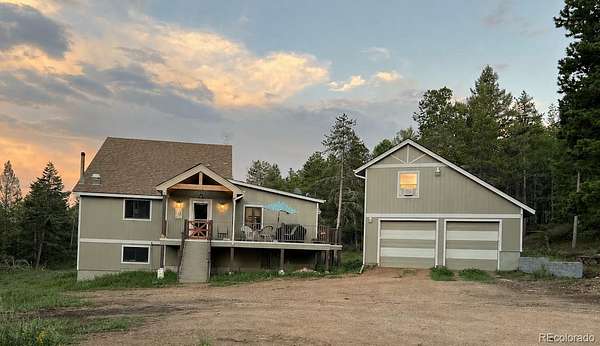 6.69 Acres of Land with Home for Sale in Conifer, Colorado