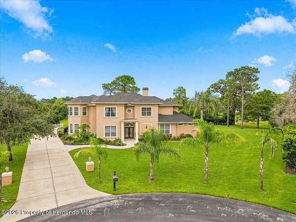 1.64 Acres of Land with Home for Sale in Spring Hill, Florida