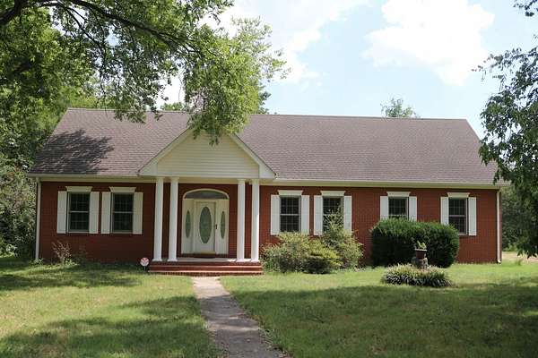 5 Acres of Land with Home for Sale in Castalian Springs, Tennessee