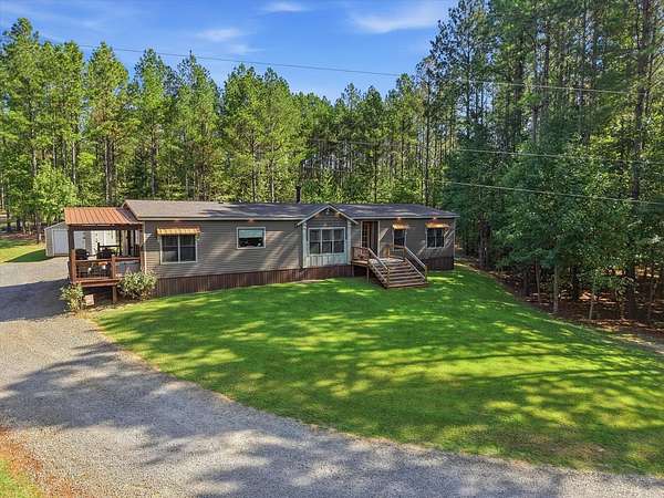 46 Acres of Recreational Land with Home for Sale in McCool, Mississippi
