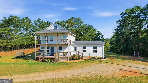 1.5 Acres of Land with Home for Sale in Ball Ground, Georgia