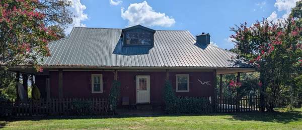 9.86 Acres of Land with Home for Sale in Greenbrier, Arkansas