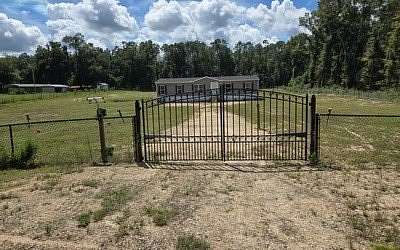 2 Acres of Land with Home for Sale in O'Brien, Florida