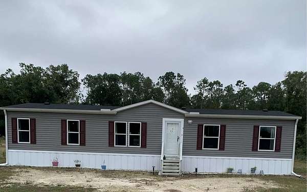 2 Acres of Land with Home for Sale in O'Brien, Florida