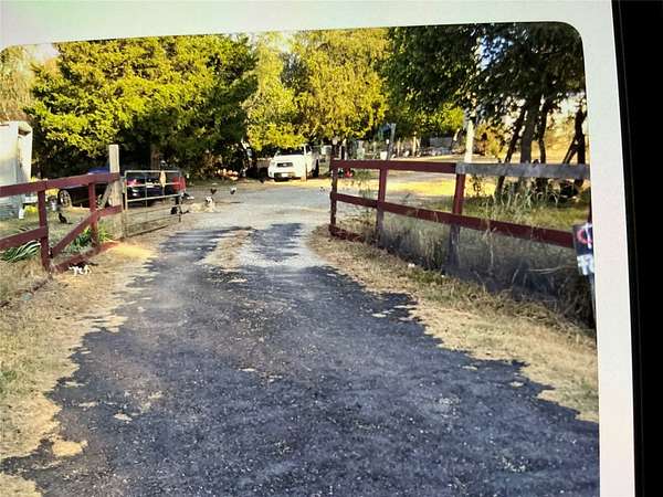 4.73 Acres of Land with Home for Sale in Richland, Texas
