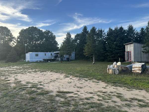 9.37 Acres of Land with Home for Sale in Hart, Michigan