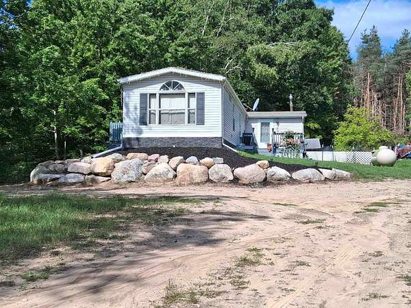2 Acres of Land with Home for Sale in Farwell, Michigan