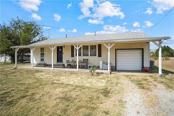 2.4 Acres of Land with Home for Sale in Coffeyville, Kansas