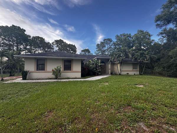 1.5 Acres of Land with Home for Lease in The Acreage, Florida