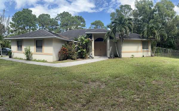 1.5 Acres of Land with Home for Lease in The Acreage, Florida