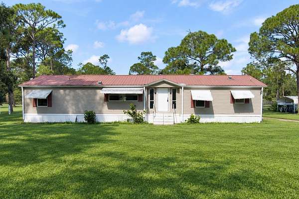4.73 Acres of Land with Home for Sale in Okeechobee, Florida