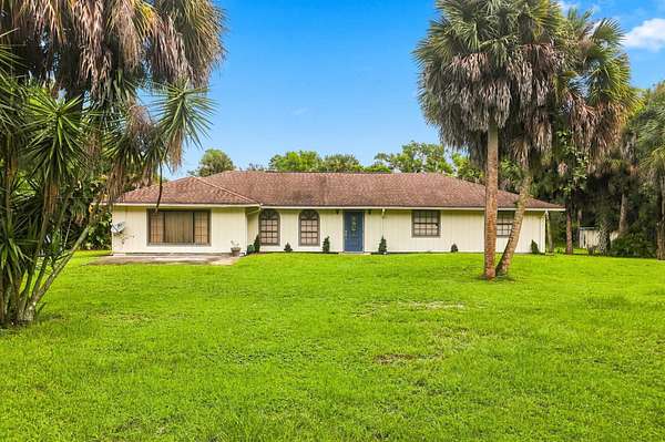2.5 Acres of Land with Home for Sale in Loxahatchee Groves, Florida