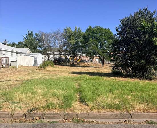 0.13 Acres of Commercial Land for Sale in Ennis, Texas