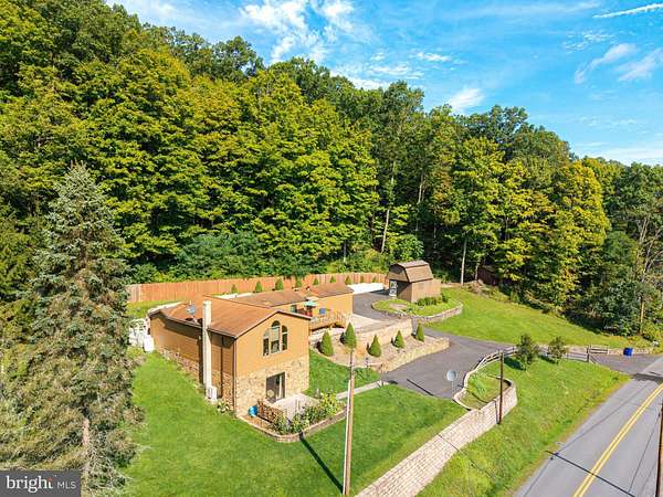 13.3 Acres of Recreational Land with Home for Sale in Manns Choice, Pennsylvania