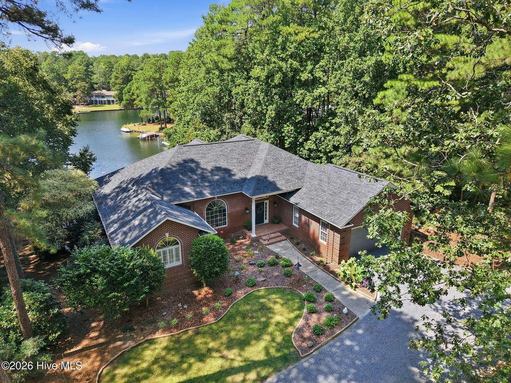 1.5 Acres of Land with Home for Sale in Seven Lakes, North Carolina