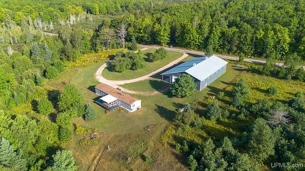 30 Acres of Land with Home for Sale in Skandia, Michigan