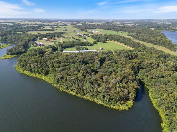 10.9 Acres of Land with Home for Sale in Gentry, Arkansas