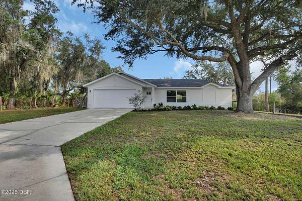 3.34 Acres of Land with Home for Sale in De Leon Springs, Florida