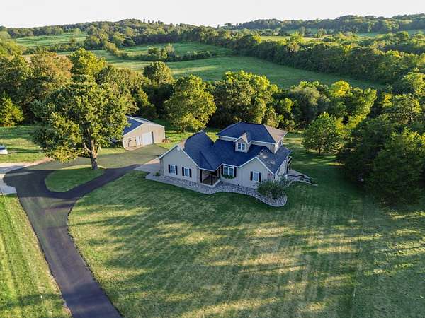 11 Acres of Land with Home for Sale in Macomb, Missouri