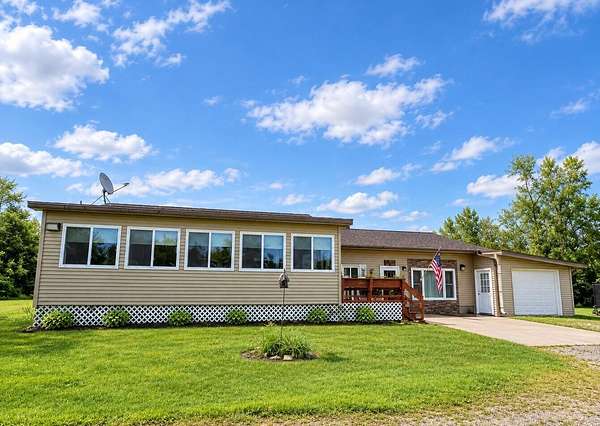 3.33 Acres of Land with Home for Sale in Ossineke, Michigan