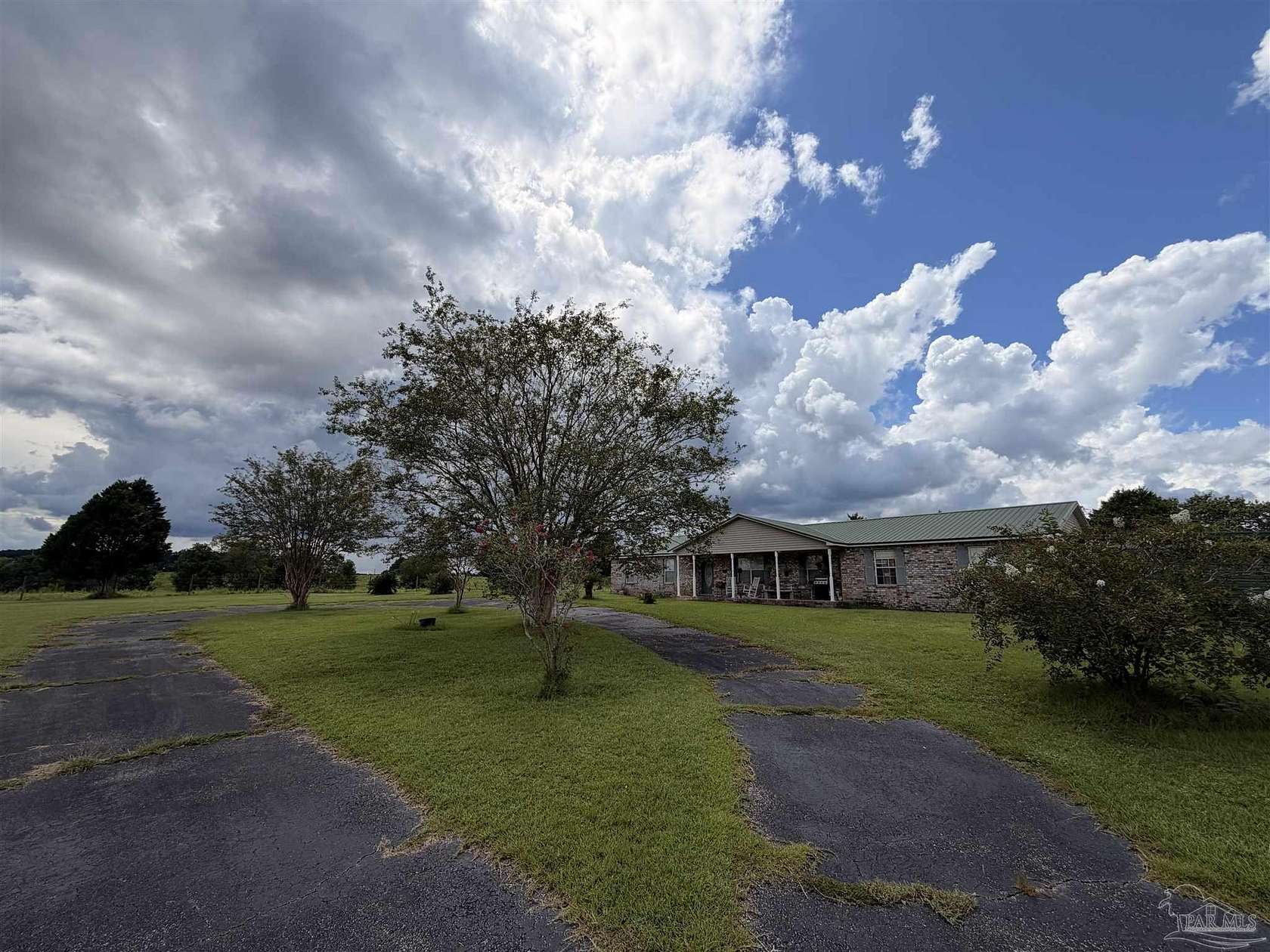 5.45 Acres of Land with Home for Sale in Molino, Florida