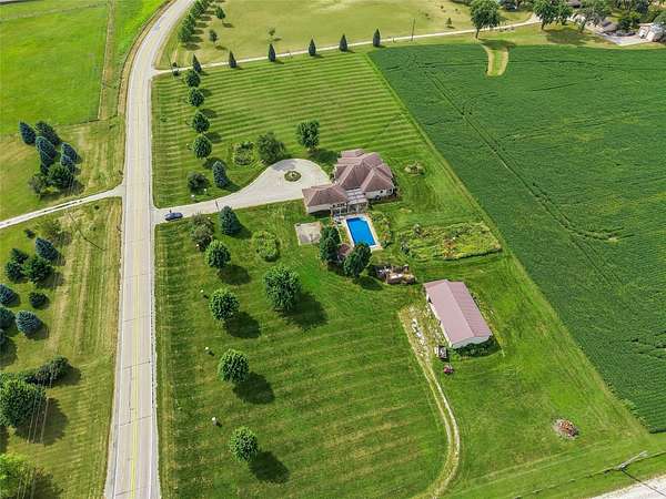 3.8 Acres of Land with Home for Sale in St. Charles, Iowa