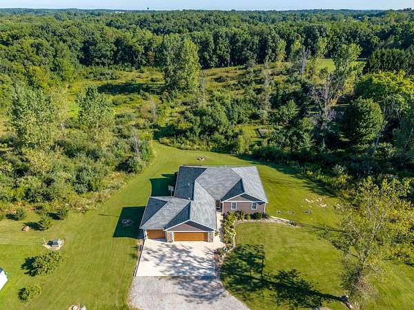 8.37 Acres of Land with Home for Sale in Angola, Indiana