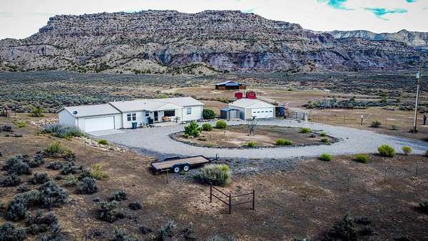 42 Acres of Land with Home for Sale in De Beque, Colorado
