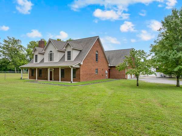 5.22 Acres of Land with Home for Auction in Lascassas, Tennessee