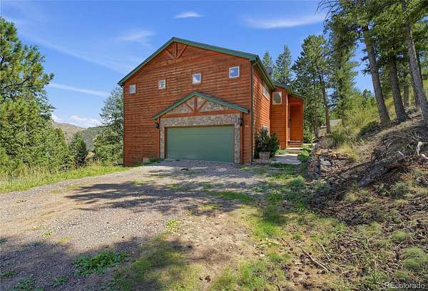 2.47 Acres of Land with Home for Sale in Evergreen, Colorado