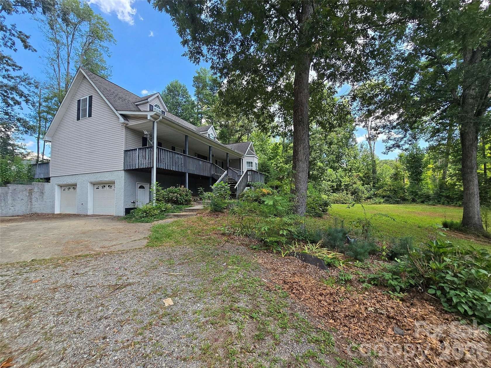1.74 Acres of Land with Home for Sale in Fletcher, North Carolina