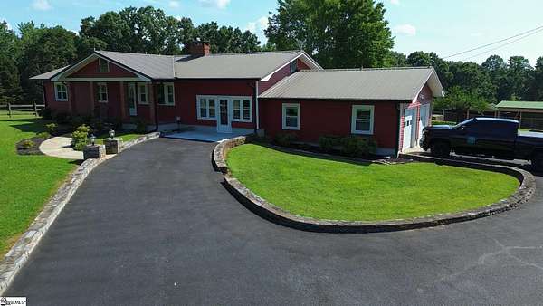 16.5 Acres of Land with Home for Sale in Columbus, North Carolina