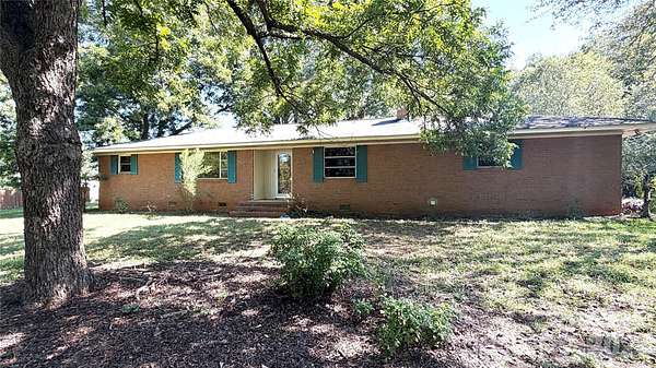 1 Acre of Land with Home for Sale in Matthews, North Carolina