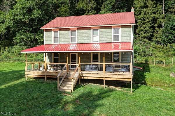 21.7 Acres of Agricultural Land with Home for Sale in Paris, Ohio